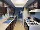 Functional kitchen with plentiful cabinet space, efficient appliances, and a window for natural light at 3232 St Jude Dr, Indianapolis, IN 46227