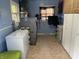 Dedicated laundry room with ample space for appliances, storage, and folding at 3232 St Jude Dr, Indianapolis, IN 46227