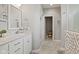 Bright bathroom featuring a single vanity with white cabinets and granite countertops at 3424 S Lookout Pass, New Palestine, IN 46163