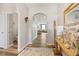 Inviting entryway with arched doorways, light-colored walls, and stylish decor at 3424 S Lookout Pass, New Palestine, IN 46163