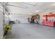 Spacious two car garage, with painted walls, and a finished floor. Equipped with cabinets at 3424 S Lookout Pass, New Palestine, IN 46163