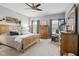 Spacious main bedroom with wood furniture, decor, and carpeted floor at 3424 S Lookout Pass, New Palestine, IN 46163