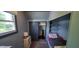 Small bedroom featuring a window, closet, and built-in bed with shelving at 35 Meadow Dr, New Palestine, IN 46163