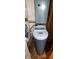 Kenmore water softener with digital display and attached plumbing fixtures at 35 Meadow Dr, New Palestine, IN 46163