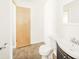 Cozy bathroom featuring a toilet, vanity with a sink, and neutral walls at 3846 Alsace Pl, Indianapolis, IN 46226