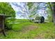 Backyard with lake view and storage building at 4080 S London Dr, Martinsville, IN 46151