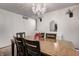Elegant dining room with modern chandelier and wood dining table at 4080 S London Dr, Martinsville, IN 46151