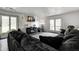 Cozy living room with plush seating, modern entertainment center, and natural light at 4080 S London Dr, Martinsville, IN 46151