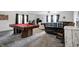 Spacious living room featuring a pool table, couches, and carpeted floors at 4080 S London Dr, Martinsville, IN 46151