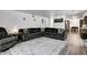 Spacious living room with a plush sectional sofa and stylish decor at 4080 S London Dr, Martinsville, IN 46151