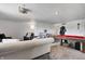 Relaxing living room featuring comfortable seating and a stylish pool table at 4080 S London Dr, Martinsville, IN 46151