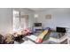 Bright playroom features natural light, wood floors, and plenty of space for fun at 4080 S London Dr, Martinsville, IN 46151