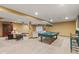 Finished basement with a pool table, recessed lighting, and a cozy seating area with lamps at 4619 Allen Dr, Carmel, IN 46033