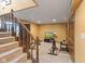 Finished basement area showcasing exercise equipment, recessed lighting, and carpet flooring at 4619 Allen Dr, Carmel, IN 46033