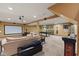 Finished basement includes a comfortable seating area, a pool table, and a large projector screen at 4619 Allen Dr, Carmel, IN 46033
