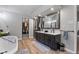 Bright bathroom featuring double vanity, and walk-in closet at 4619 Allen Dr, Carmel, IN 46033