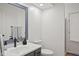 Clean bathroom with a framed mirror, modern sink, and walk-in shower providing a refreshing experience at 4619 Allen Dr, Carmel, IN 46033