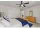 Bedroom with ceiling fan, double closets, and dresser at 4619 Allen Dr, Carmel, IN 46033