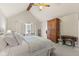 Serene bedroom features a vaulted ceiling, a comfortable bed, and classic furnishings for ultimate relaxation at 4619 Allen Dr, Carmel, IN 46033