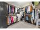 Walk-in closet with ample storage, including shelving, drawers, and hanging space, ensuring organization and convenience at 4619 Allen Dr, Carmel, IN 46033