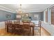 Elegant dining room with a chandelier and a large table, great for hosting dinner parties and gatherings at 4619 Allen Dr, Carmel, IN 46033