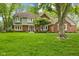 Charming two-story home with a well-manicured lawn and mature trees in a peaceful, established neighborhood at 4619 Allen Dr, Carmel, IN 46033
