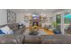 Cozy living room features a brick fireplace, built-in shelves, and comfortable seating at 4619 Allen Dr, Carmel, IN 46033