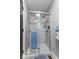 Modern shower with glass door, marble tile, and chrome fixtures at 4619 Allen Dr, Carmel, IN 46033