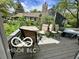 View of the patio with seating, with the exterior of the house visible in the background at 4655 Framington Ct, Indianapolis, IN 46254