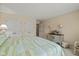 Comfortable bedroom with a bed, dresser, and closet space at 4711 Bentley Dr, Carmel, IN 46033