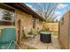 Cozy patio area with stone exterior, outdoor furniture, and stone pavers at 5005 Bonnie Brae St, Indianapolis, IN 46228