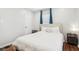Comfortable bedroom with a plush queen bed, neutral tones, and natural light at 5254 Kingsley Dr, Indianapolis, IN 46220