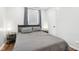 Comfortable bedroom with a soft bed, matching nightstands, and window light at 5254 Kingsley Dr, Indianapolis, IN 46220