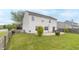 Wide open backyard featuring a picnic table and patio space at 5849 Wooden Branch Dr, Indianapolis, IN 46221