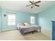 Spacious bedroom with ample natural light and comfortable bedding at 5849 Wooden Branch Dr, Indianapolis, IN 46221