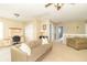 Upstairs living room features a desk, sofa and 3 windows at 5849 Wooden Branch Dr, Indianapolis, IN 46221