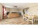 Spacious living area with a fireplace, a seating area, and dining set with an open floor plan at 5849 Wooden Branch Dr, Indianapolis, IN 46221