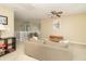 Open-concept living room with ample seating and natural light at 5849 Wooden Branch Dr, Indianapolis, IN 46221