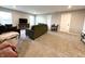 Upstairs Bonus room features neutral walls and carpet, lots of seating and entertainment area at 6040 Bluecrest Dr, Brownsburg, IN 46234