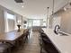 Open-concept space includes a dining area, kitchen, and living area, perfect for entertaining at 6040 Bluecrest Dr, Brownsburg, IN 46234