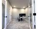 Office space with a neutral color scheme, two doors and carpeted floors at 6040 Bluecrest Dr, Brownsburg, IN 46234