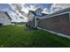 Green lawn on the side of the house, showing landscaping at 6040 Bluecrest Dr, Brownsburg, IN 46234