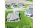 Aerial view of home showcasing the backyard, patio, and surrounding neighborhood at 6077 W David Wayne Dr, New Palestine, IN 46163