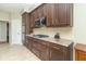 Stylish kitchen featuring granite countertops, stainless steel appliances, and ample storage at 6077 W David Wayne Dr, New Palestine, IN 46163