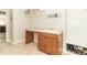 Laundry room with sink, counter space, cabinet, and hanging rack at 6077 W David Wayne Dr, New Palestine, IN 46163