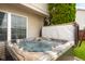 Relax in this backyard hot tub with multicolor lights, a perfect escape for unwinding after a long day at 6096 E Conestoga Trl, Columbus, IN 47203