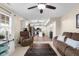 Spacious living room has an open floorplan and seamlessly connects to the kitchen area at 6096 E Conestoga Trl, Columbus, IN 47203