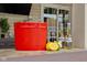 A red bucket of beer with lemon sitting on a bar ready to enjoy at 6096 E Conestoga Trl, Columbus, IN 47203