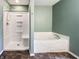 Bathroom features a separate shower and soaking tub, perfect for relaxation at 625 Streamside Dr, Greenfield, IN 46140