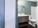 Bathroom showcases a vanity with ample storage and a tub/shower combo, offering functionality at 625 Streamside Dr, Greenfield, IN 46140